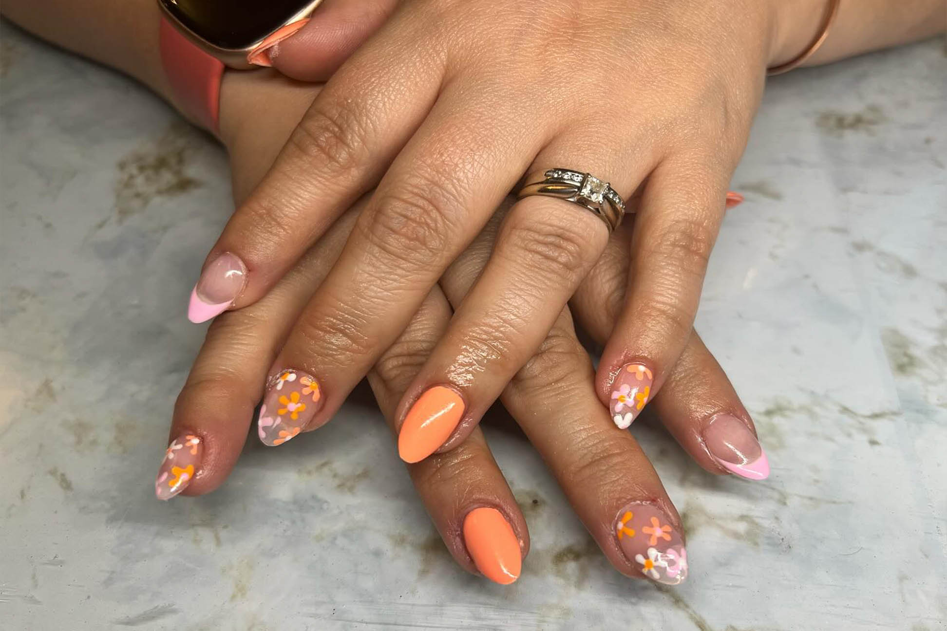 yellow and black painted nails, flowers